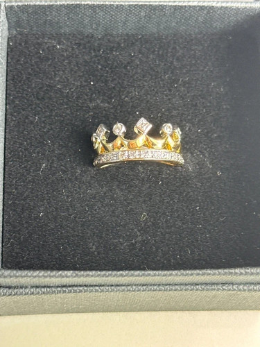 Gold crown ring set with - , clear