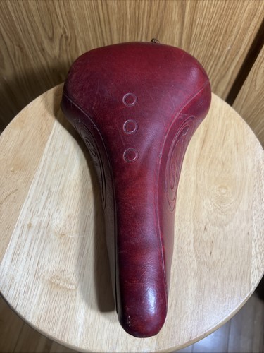 Vintage red bicycle saddle - vintage,