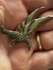 ANTIQUE STERLING SILVER AND ENAMEL FLYING BIRD BROOCH
