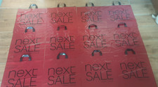 12 red new next sale plastic carrier bags