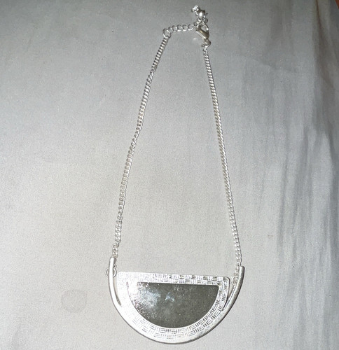 Silver tone half - silver, pendant