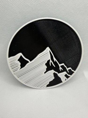 Mountain rear door badge - door,