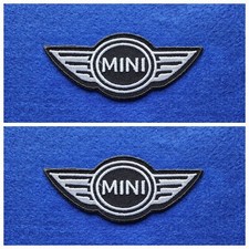 A Pair Of Motor Car Racing