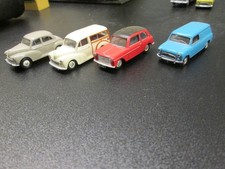 FOUR OXFORD/CARARMA VEHICLES OO SCALE