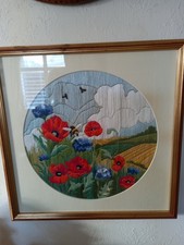 A Embroidered Silk Picture Poppies Groing.