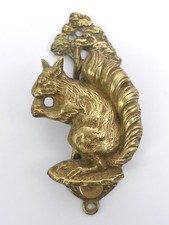 ANTIQUE BRASS SQUIRREL DOOR