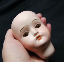 Antique bisque german doll - 2/0,