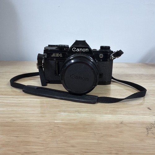 Canon black 35mm slr film - ae-1,