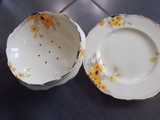 VINTAGE CROWN DUCAL SALAD BOWL WITH DRAIN HOLES ON PLATE