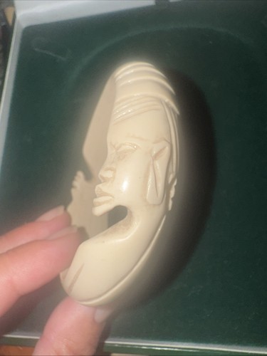 Intricately carved african - intricately,