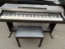 Yamaha clavinova CLP-311 with stool and cover