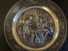 12 collectable pewter plates 4