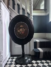 Black Victorian tilt top papier mache table with floral top and mother of pearl