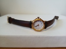 Marks and Spencer slender ladies wrist watch with brown leather strap and round