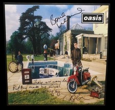 SIGNED OASIS BONEHEAD BRIAN CANNON BE HERE NOW VINYL LP WITH ADDED LYRICS RARE