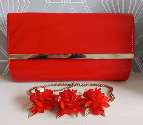 Red gold patent clutch bag - red,