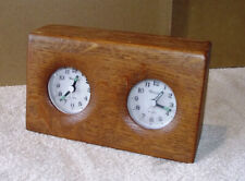 Unusual dual battery clocks in oak case