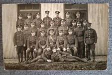 WW1 soldiers group real photo postcard two in front a bit camp!