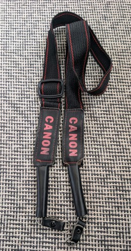 Black 1980s canon neck strap - canon,