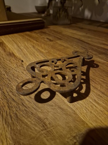 Victorian iron shaped trivet - iron,
