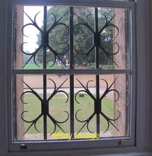 Photo 6x4 Wrought iron window