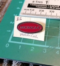 Microcar Manufacturers Logo.              Car Pin Badges
