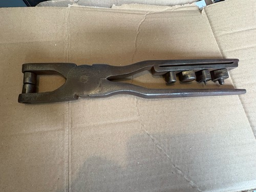 Vintage hand held hole punch - held,