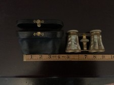 A Good Pair Of Mother Of Pearl Mounted Opera Glasses And Their Case