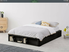 Black wood double bed by