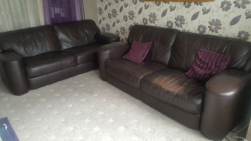 Two dark brown leather - , sofa's