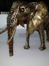 Genuine Pangea metal elephant from Pangea Sculptures for indoor or outdoor use.