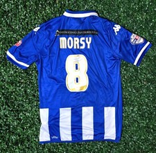 Signed Wigan Athletic