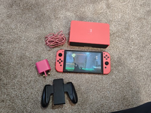 Nintendo switch oled 64gb - nintendo,