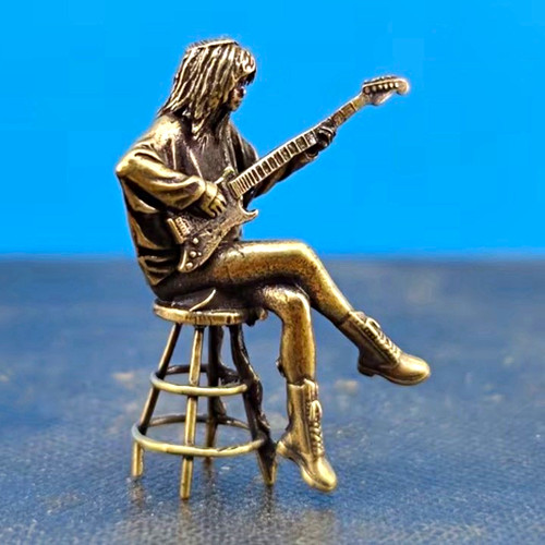 Brass seated guitarist - brass,