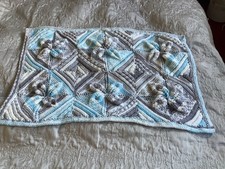 Hand Knitted Baby Blanket . Blue, Grey & White. 36” X 24” with kangaroo rattle