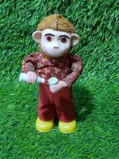 Old Monkey drinking toy wind