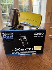   SANYO XACTI VPC-CA100 WATERPROOF DUAL CAMERA  PHOTO/VIDEOS YELLOW UNUSED