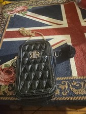 Black And Gold River Island Small Party Bag.