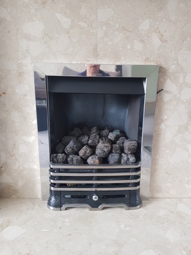 Silver fire surround and black - surround,