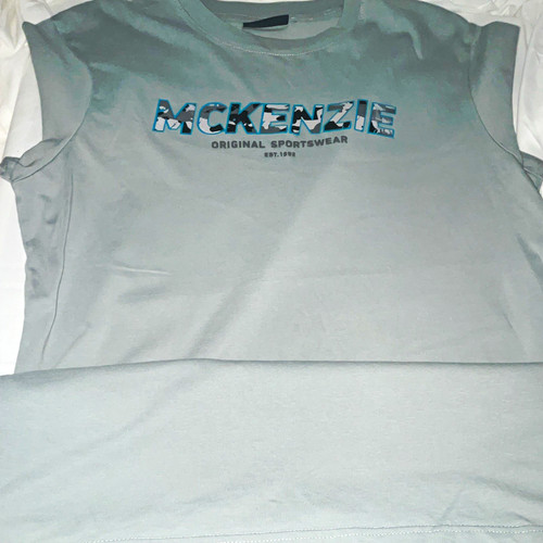 Mckenzie men grey logo - mckenzie,