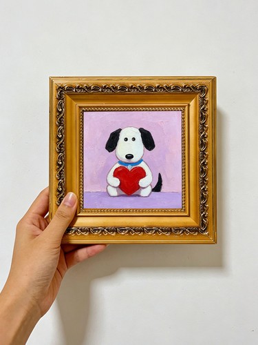Cute dog holding red - holding,