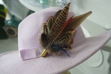 feather and bullet brooch, hat pin, lapel pin, wedding buttonhole