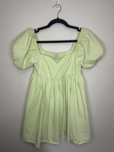Hunter brown lime green puff - &,