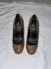 Tan snakeskin print kitten