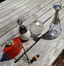 Four vintage perfume bottles - Worth, Boucheron, Dior, Yves Saint Laurent 