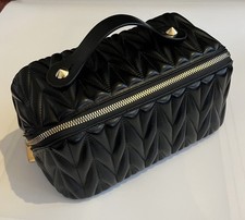Black Open Flat Makeup Bag with gold fixtures and brown interior 
