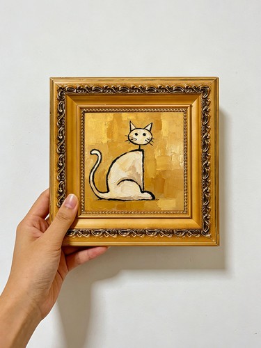 Gold cat sitting - gold,