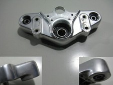 Triple clamp top fork bridge