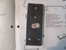 NEW EXHAUST MOUNTING STRAP -