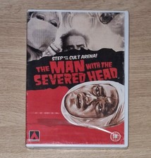 THE MAN WITH THE SEVERED HEAD
